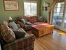 Living area featuring hardwood / wood-style floors