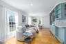 Living room featuring light wood finished floors, recessed lighting, and baseboards