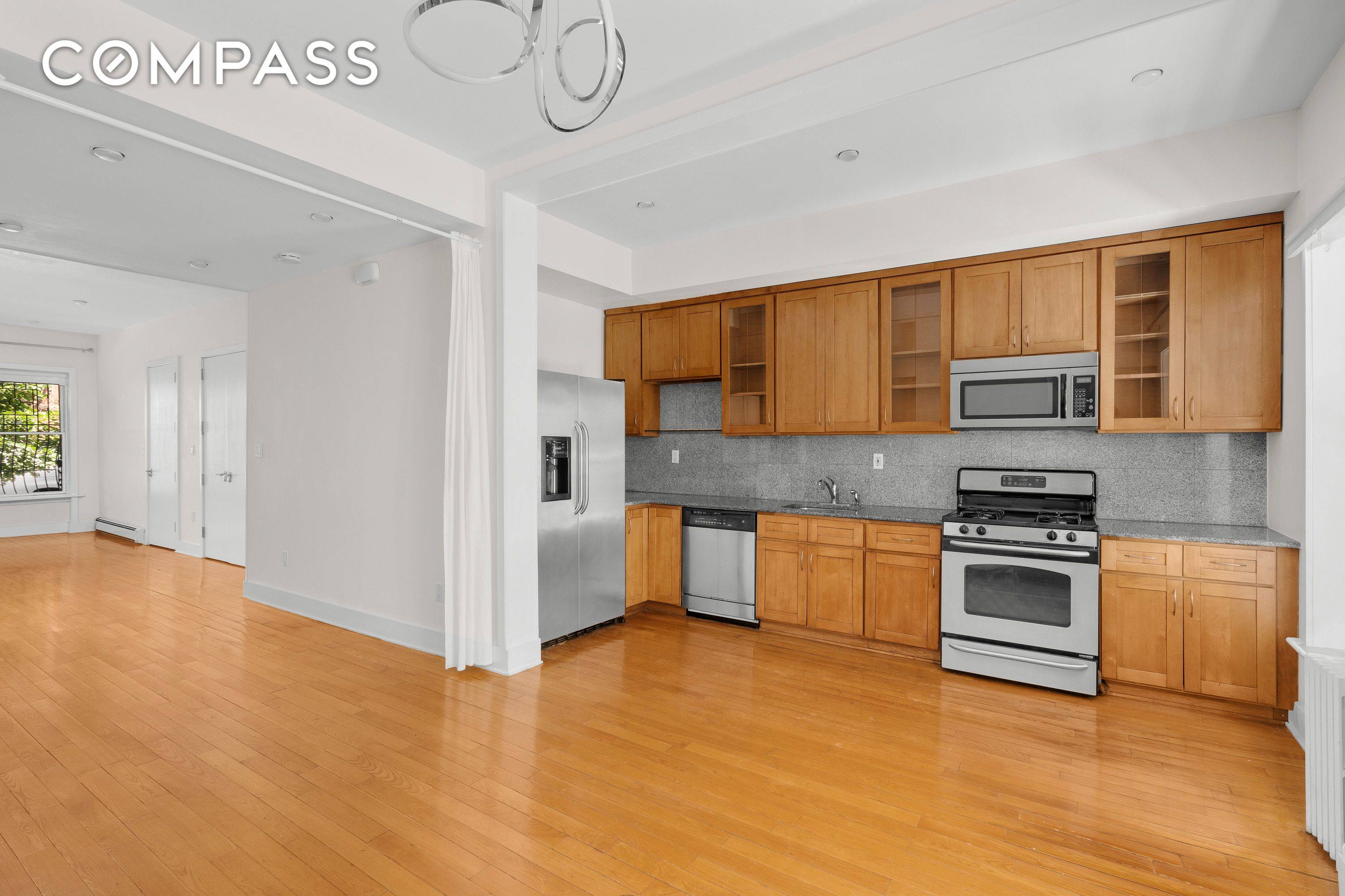 This spacious, fully updated loft like studio convertible one bedroom floor thru occupies the entire parlor floor of a Park Slope rowhouse and with an infinitely flexible open plan layout.