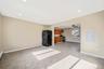 Unfurnished living room with recessed lighting, electric panel, light tile patterned floors, and a ceiling fan