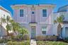 Coastal inspired Margaritaville cottage in Kissimmee Florida near Disney with vibrant exterior and prime resort location