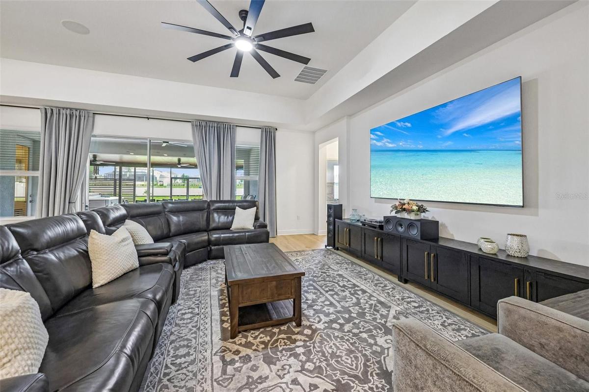 Oversized sliding glass doors deliver the ultimate indoor/outdoor living and entertaining.