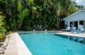 Mature tropical landscape surrounds the property