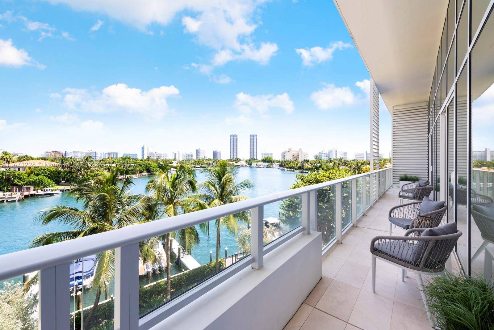 Beautiful, bright and spacious residence with unobstructed water views at the Ritz Carlton Miami Beach.