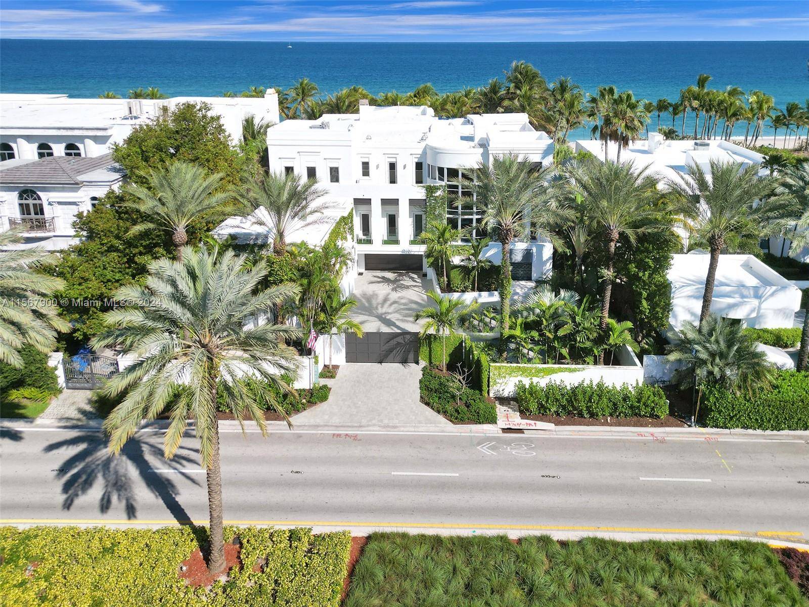Step into paradise with this 7 bed, 8 bath stunner sprawled across 13, 000 sqft !