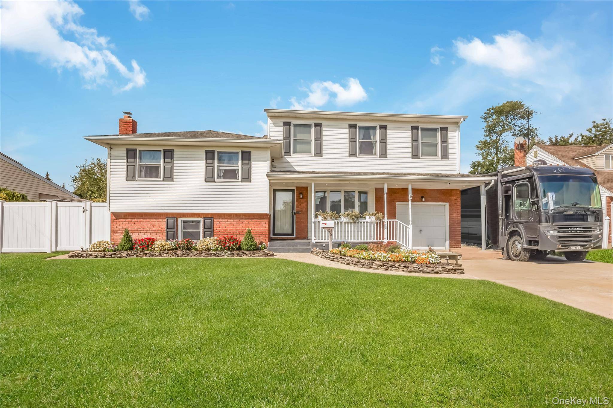 Welcome to this stunning four level split home, offering five bedrooms and 2, 5 beautifully updated baths.