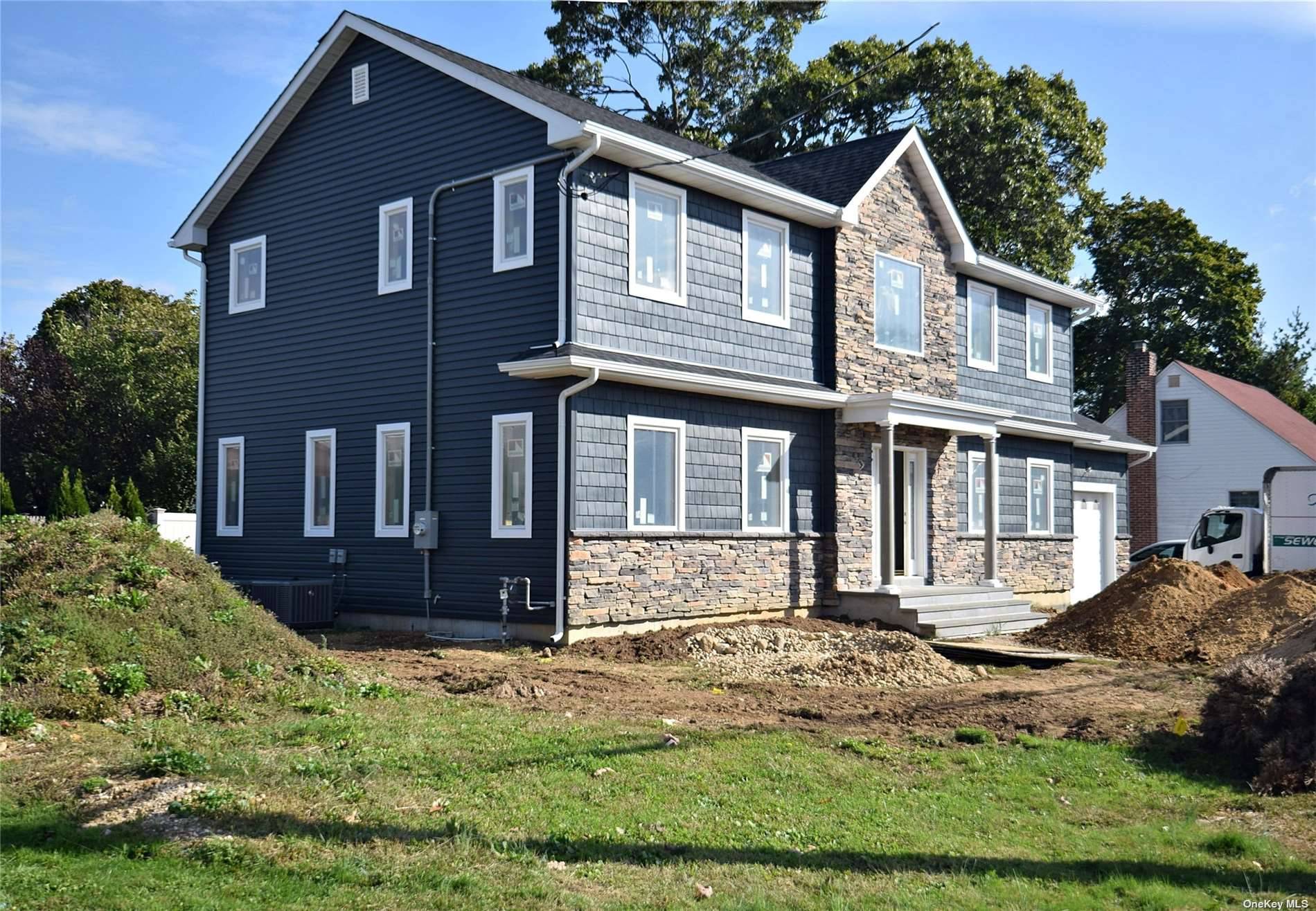 A true QUALITY home, featuring 2x6 exterior construction super insulated ; first grade vinyl siding W stone accents, blue stone front steps, Drywells for all gutters and leaders, First grade ...