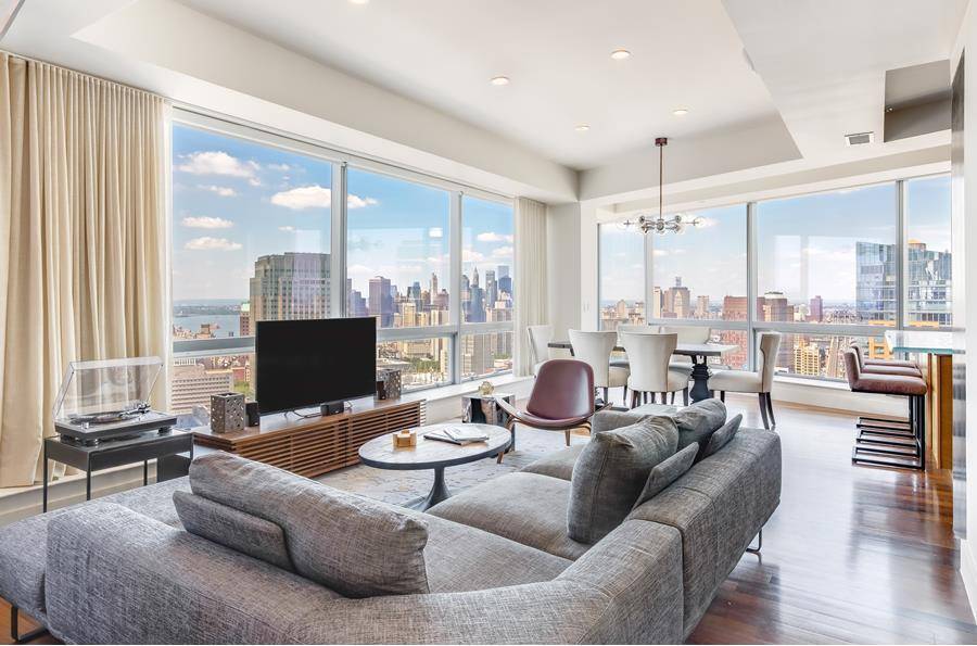 Corner duplex with floor to ceiling windows with unsurpassed views of Brooklyn, Manhattan, and Williamsburg Bridges, as well as the Verrazzano Narrows and the Statue of Liberty, and the entire ...