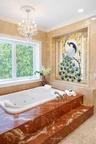 Phylrich dolphin fixtures, a Peacock inlaid in marble , a large sauna, soaking tub, multi-jet full-body rain shower, multiple vanities, and expansiv