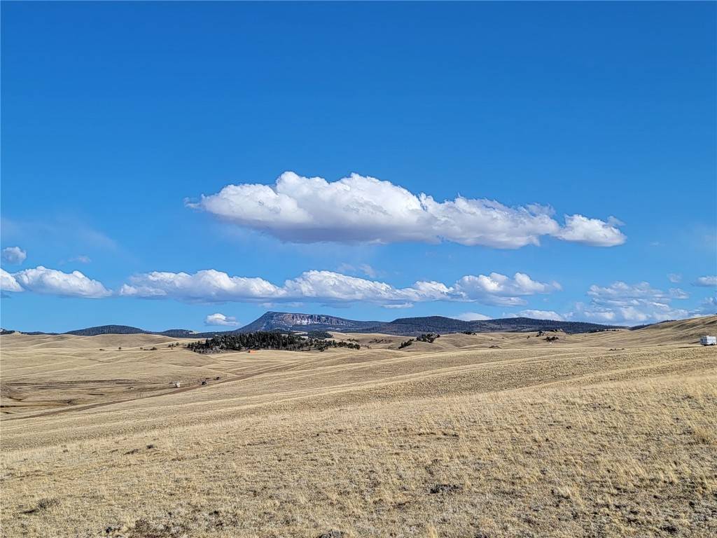 This 5 acre property offers outstanding views and rolling hills.