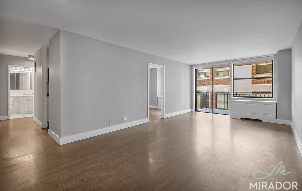 Beautiful 2 BR 1. 5 Bath corner unit on the 14th floor of New York Tower featuring a private south facing balcony, high ceilings and a large living room.