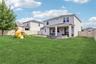 Virtually staged Back Yard -grass only