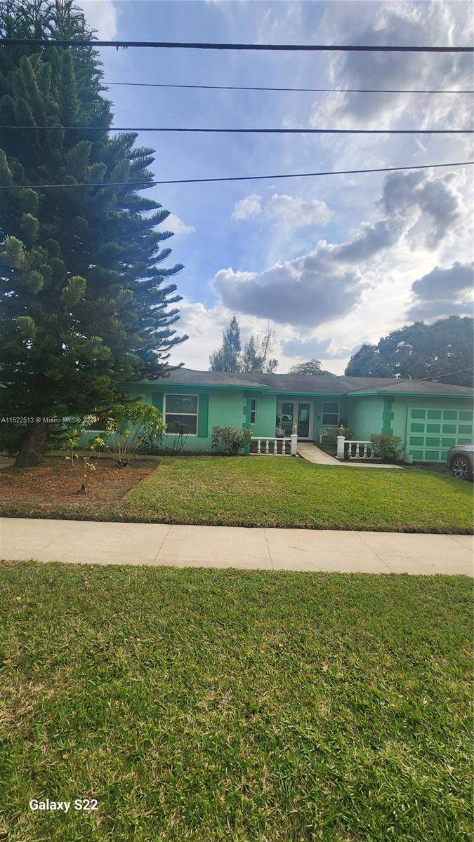 This spacious well kept four bedroom two bathroom home in the well sought after Scott Lake community just 5 10 minutes south of the Hard Rock Stadium.