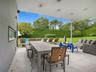 View of patio with an outdoor living space, outdoor dining space, and an outdoor pool