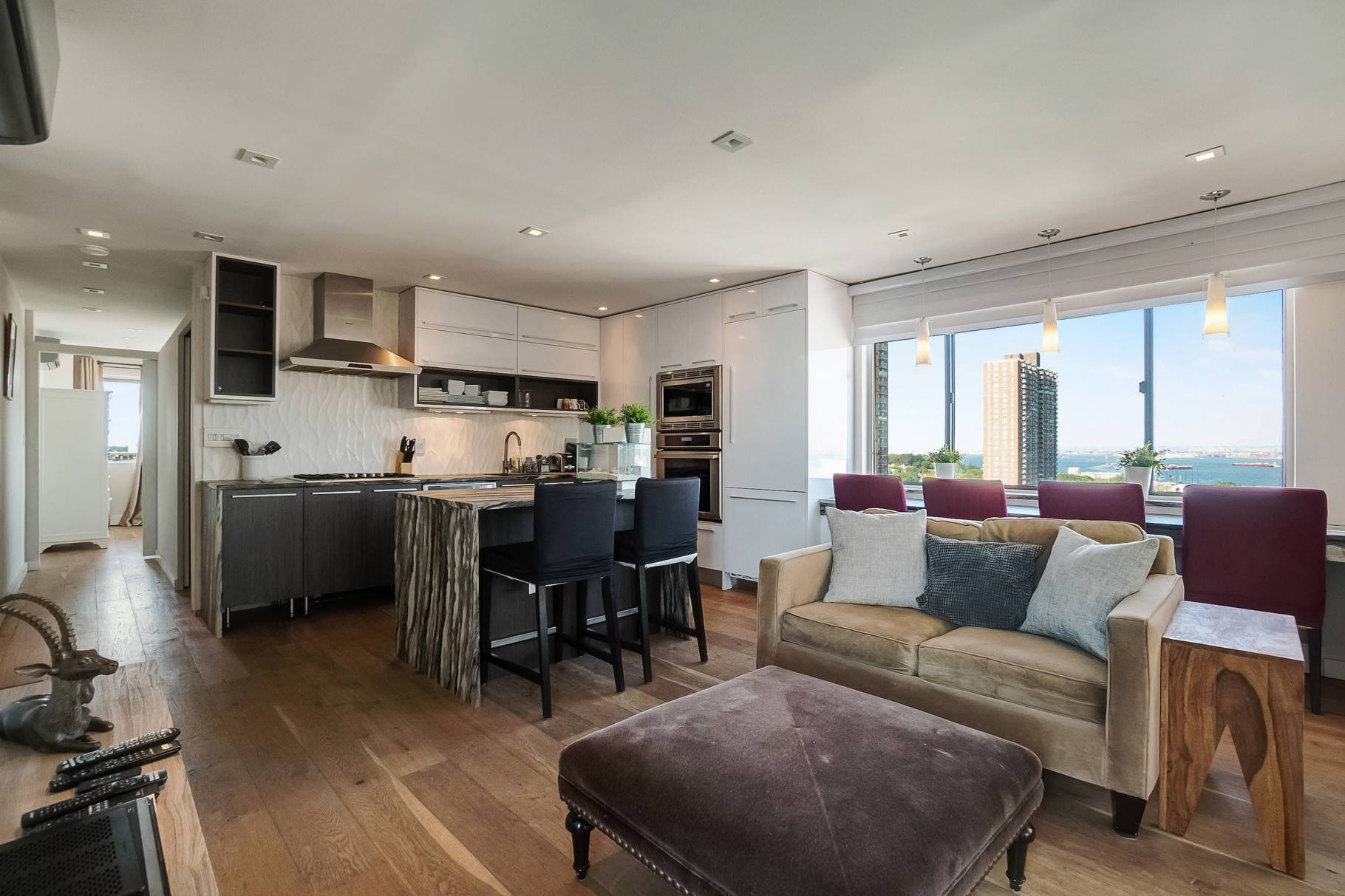 Stunning views, tremendous outdoor space, and versatile living areas describe this triplex penthouse condo on the border of Sunset Park and Bay Ridge.
