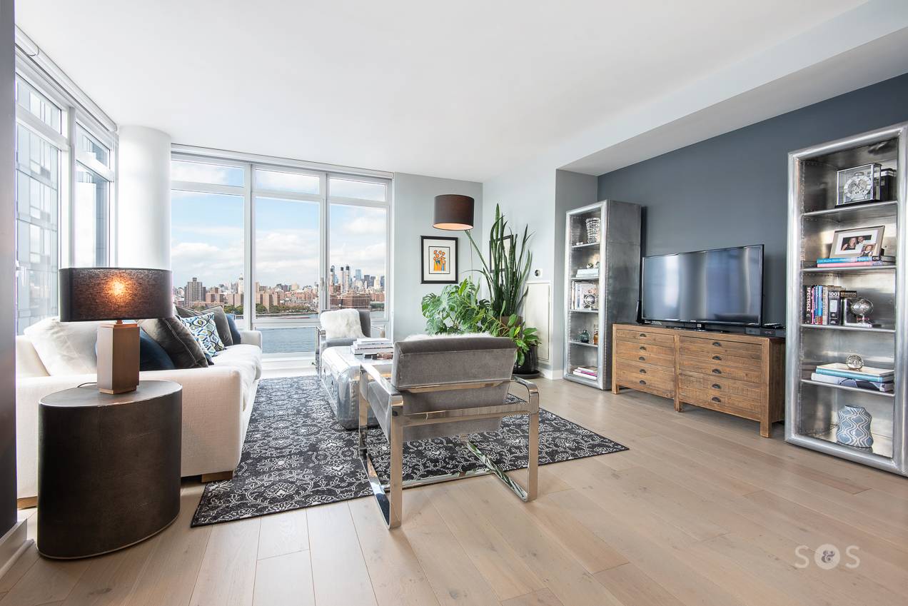 This magnificent corner unit, perched on the 14th floor of 2 Northside Piers is among the best condos on the market in Williamsburg, Brooklyn.