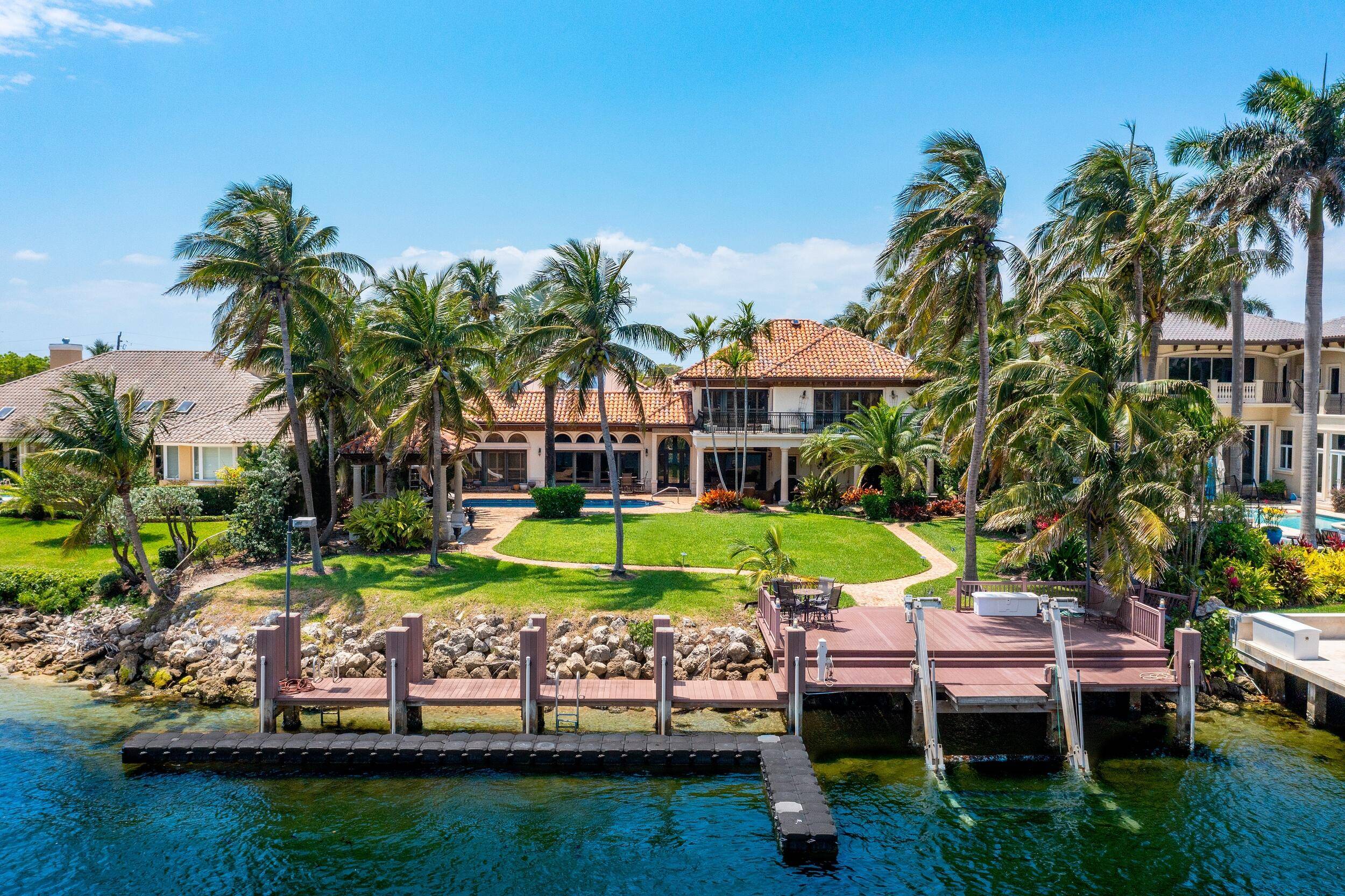 This very classy and comfortably spacious Mediterranean house is a must see home for anyone looking for a large home with the ultimate lot, directly on the Intracoastal.