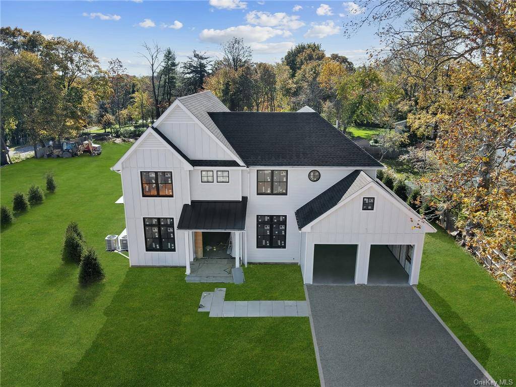 Modern 6 Bedroom luxury BRAND NEW construction colonial home with in ground heated gunite pool in the coveted Pine Ridge section of Rye Brook.