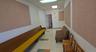 Hallway with a paneled ceiling