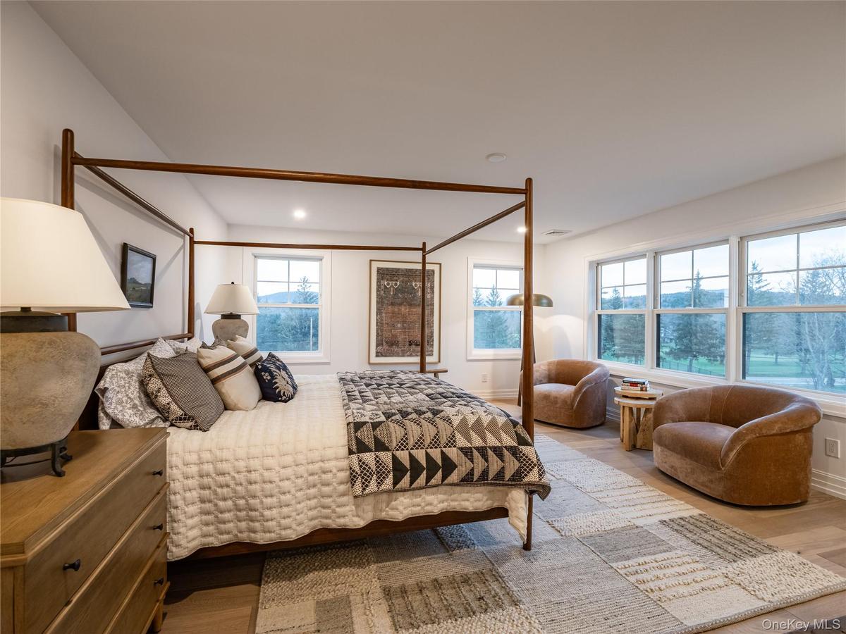 Bedroom featuring light wood finished floors and recessed lighting
