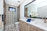 Master Bedroom with Double Vanity and Walk in Shower