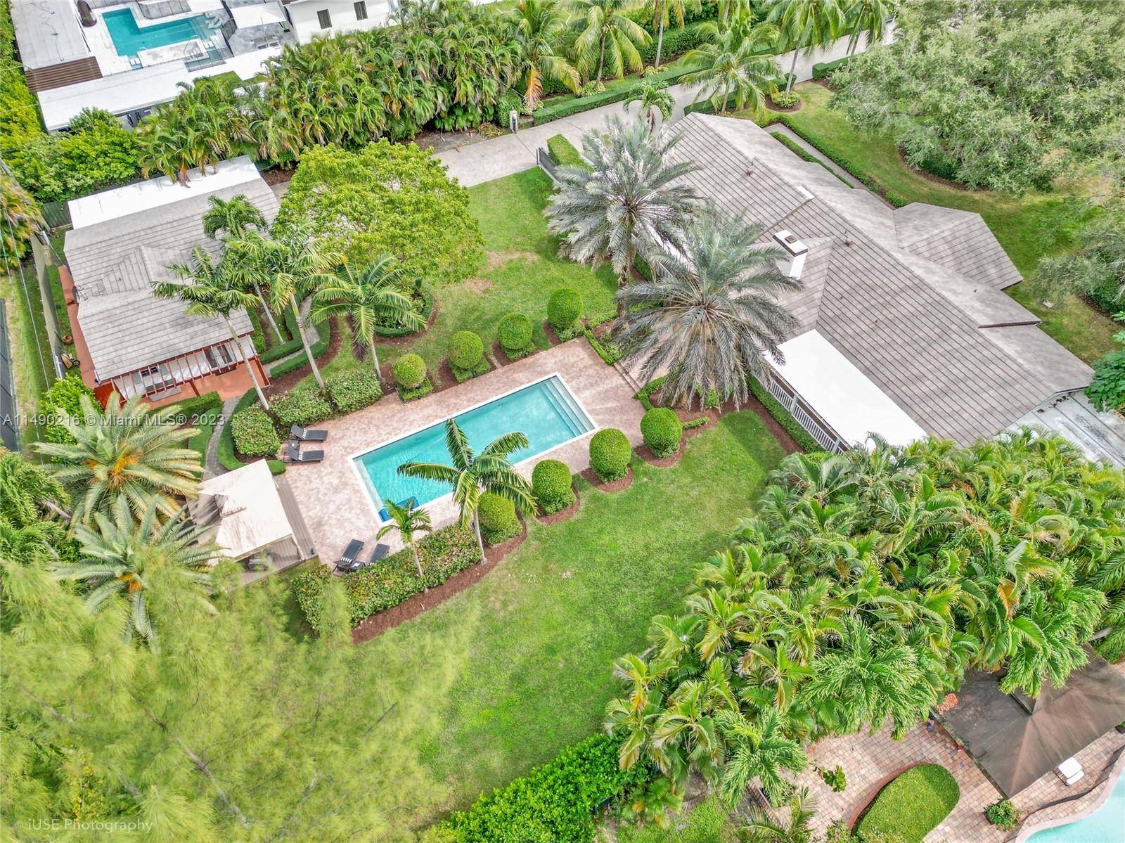 Discover serenity on this expansive property nestled in Palmetto Bay.