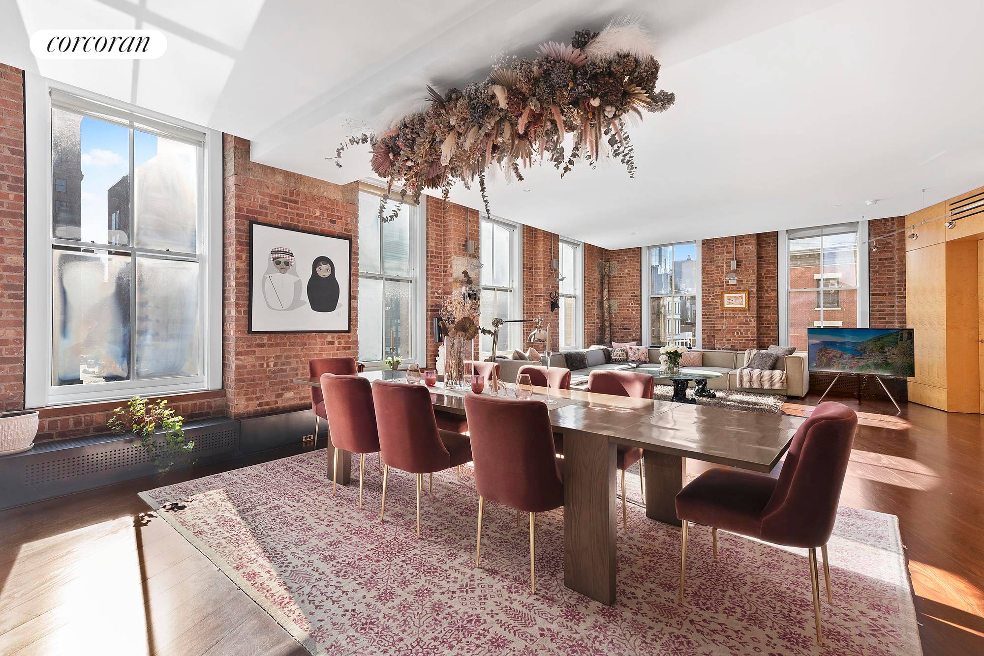 This full floor vintage Tribeca loft welcomes exceptional living and entertaining with its grand proportions and well planned five bedroom, four bathroom layout in one of Tribeca's best boutique condominiums.