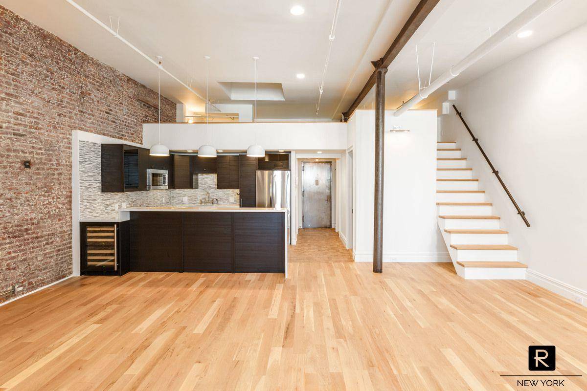 Exceptional gut renovated Loft configured as a one bedroom, one and half bathroom apartment with an additional 275 sf of mezzanine space.