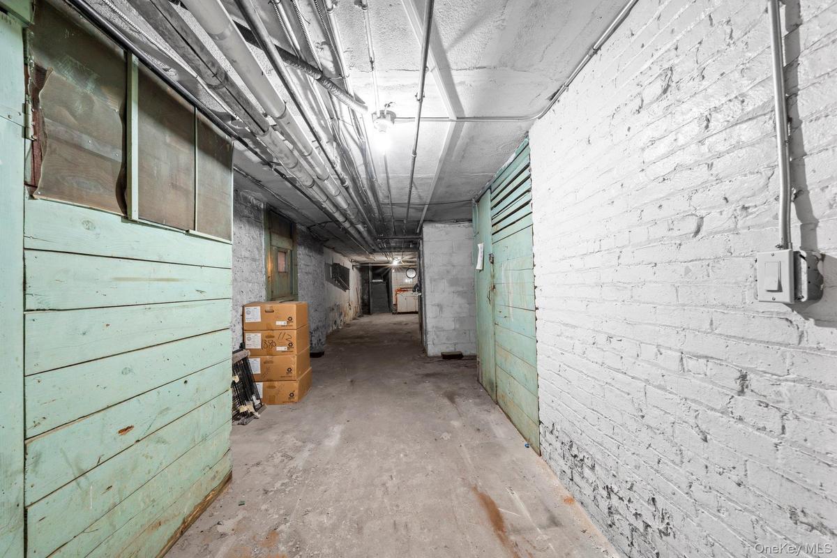 Hall with concrete flooring