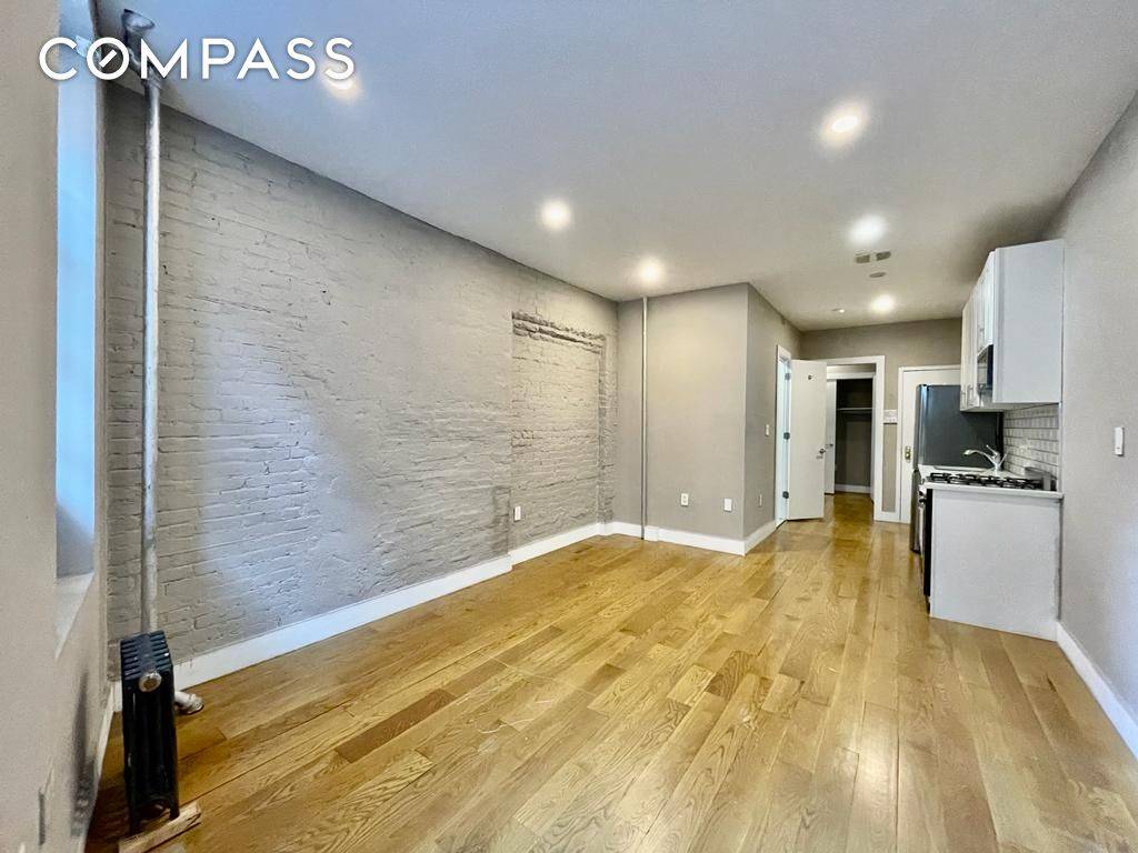 Prime Nolita SoHo Renovated Studio Home Office with W D in unit Renovated kitchen and stainless steel appliances.