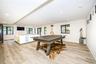 Recreation room with recessed lighting, light wood-type flooring, and baseboards