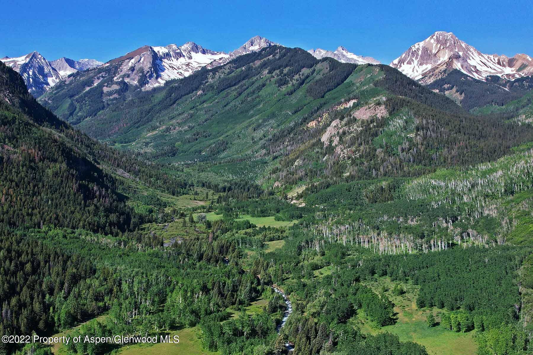 Encompassing a picturesque mountain valley nestled at the base of towering peaks, Snowmass Falls Ranch offers the ultimate combination of natural beauty, seclusion, and access to world class amenities.