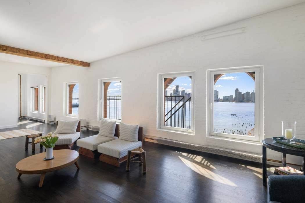 Classic Tribeca penthouse loft with private rooftop terrace.