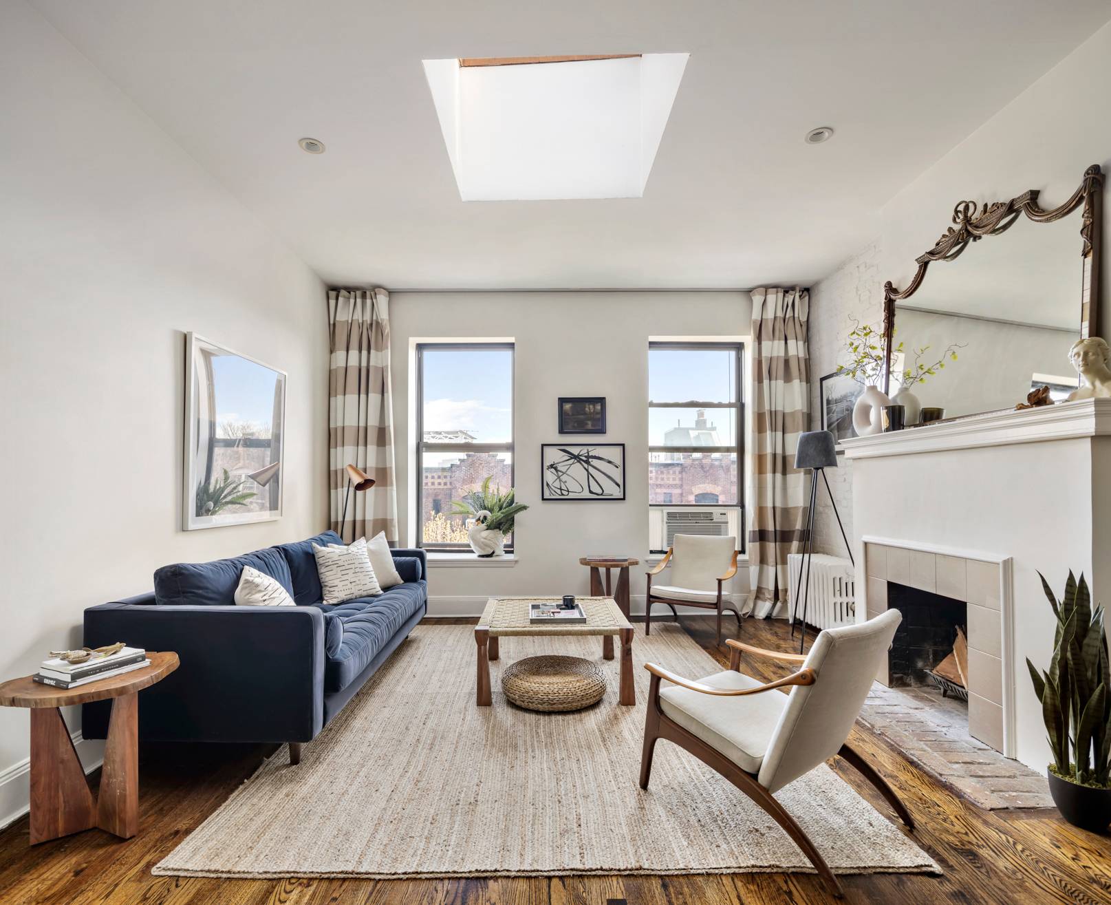 Perched atop the rooftops of Park Slope, this stunning and sunny two bedroom gushes style, originality, spectacular views, rare outdoor space, and spatial flow.