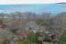 View of property location with a large body of water