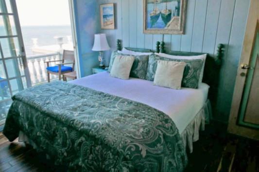 Bedroom with wood finished floors