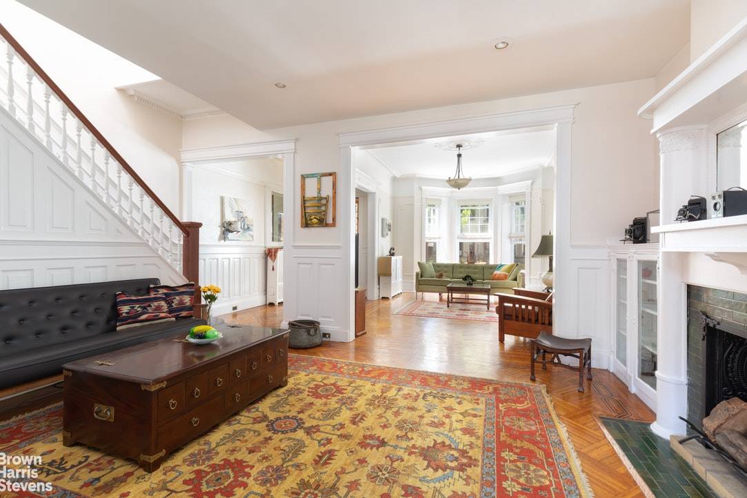 Built in 1910, designed by renowned architect Axel Hedman, this lovely limestone townhouse sits on coveted Maple Street, one of Historic Lefferts Manor's most beautiful tree lined blocks.