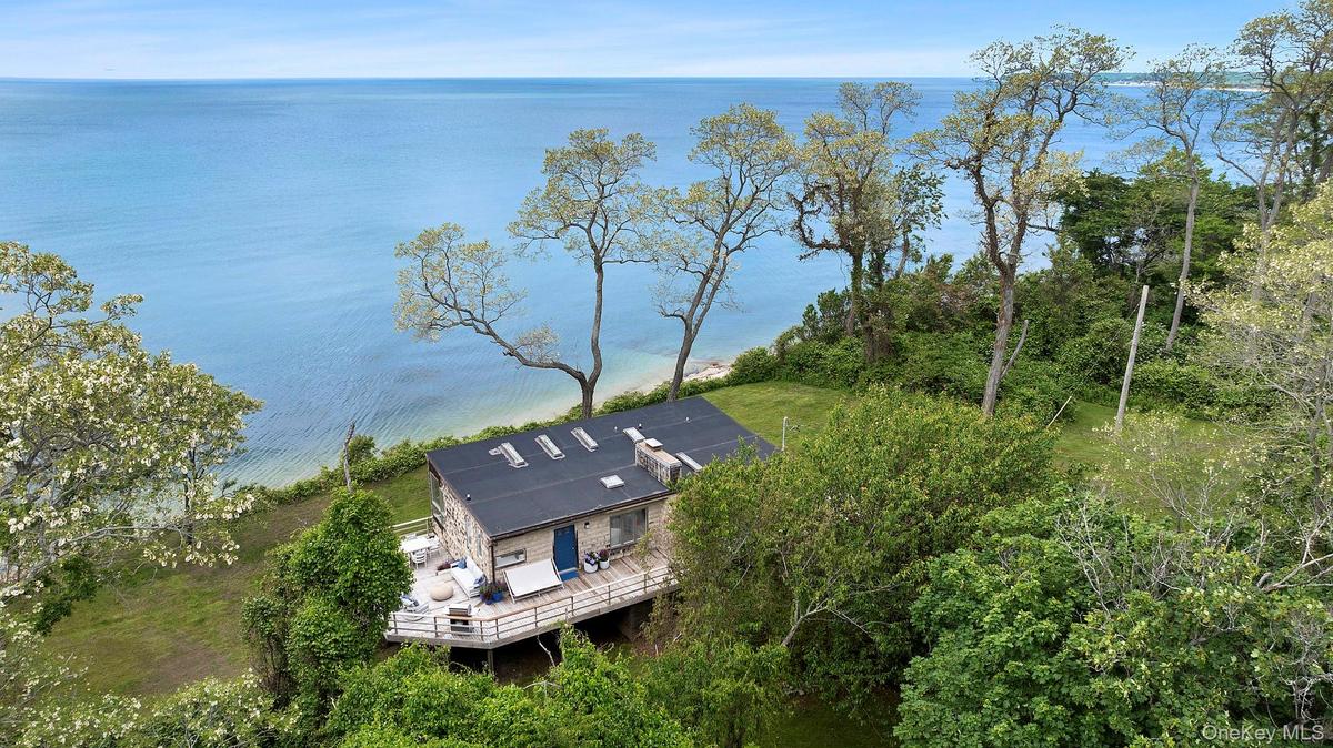 View of subject property featuring a nearby body of water