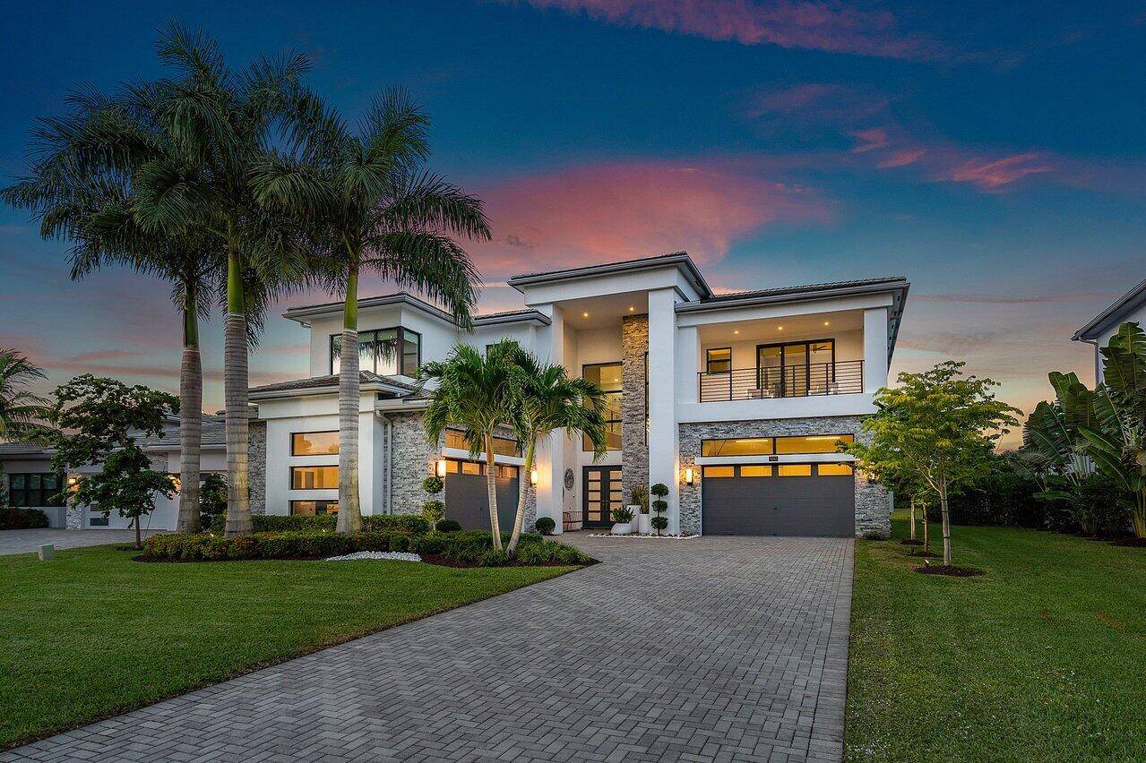 Step into this unparalleled Boca Bridges custom contemporary estate like no other.