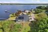 Aerial view showcasing private and lakefront setting