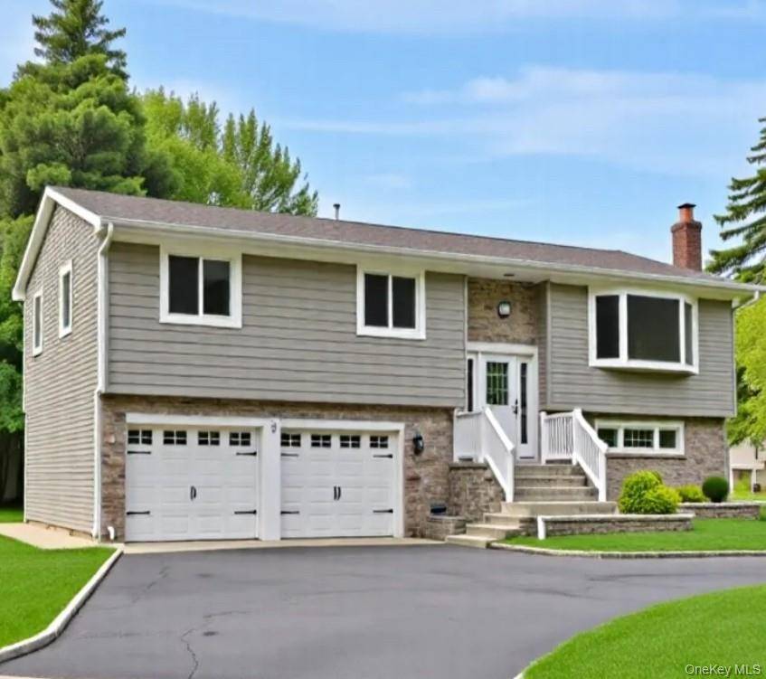 Welcome to this absolutely beautiful Hi Ranch home, nestled on an oversized 12, 980 sqft corner lot, in the heart of Bethpage, with Bethpage schools.