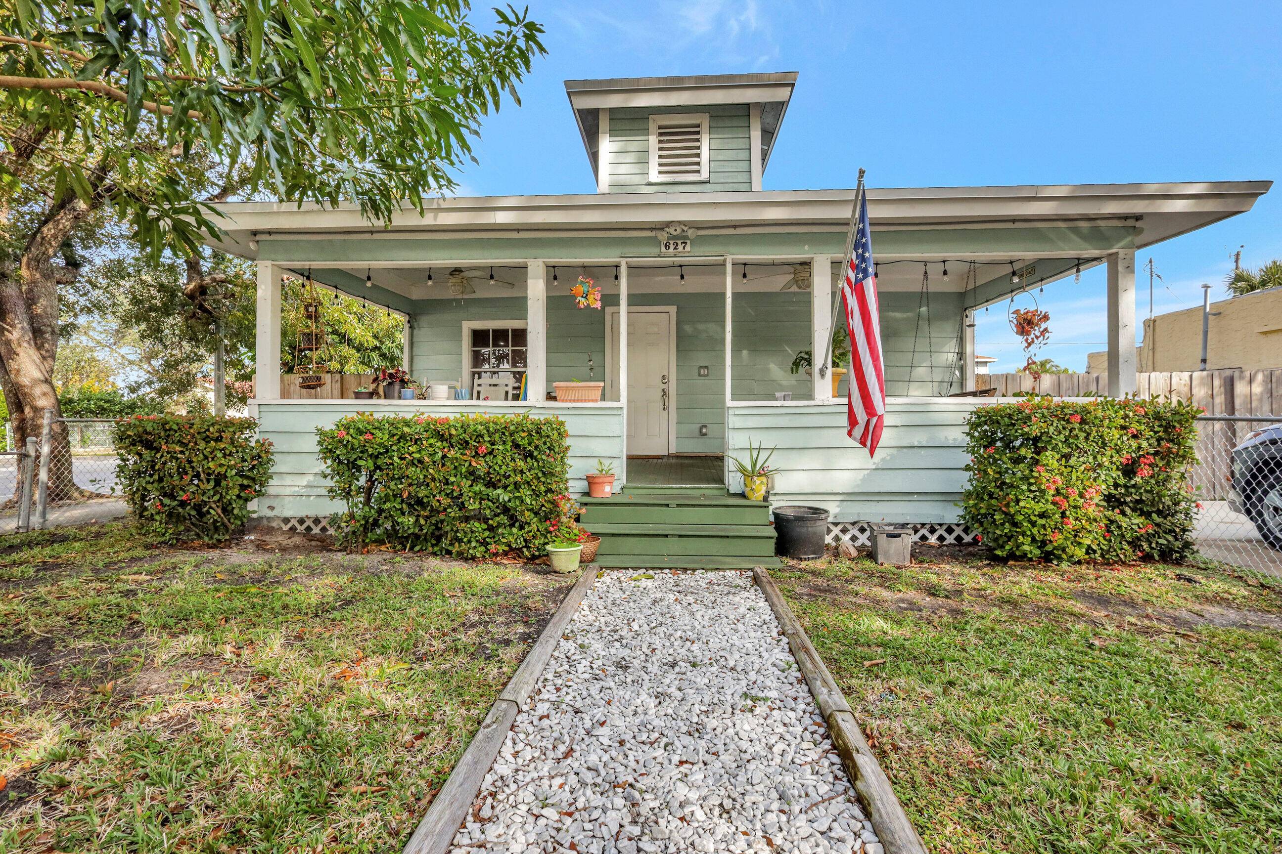 Income generating Key West Style home conveniently nestled between Flamingo park, El Cid, Prospect Park, and north of SoSo.