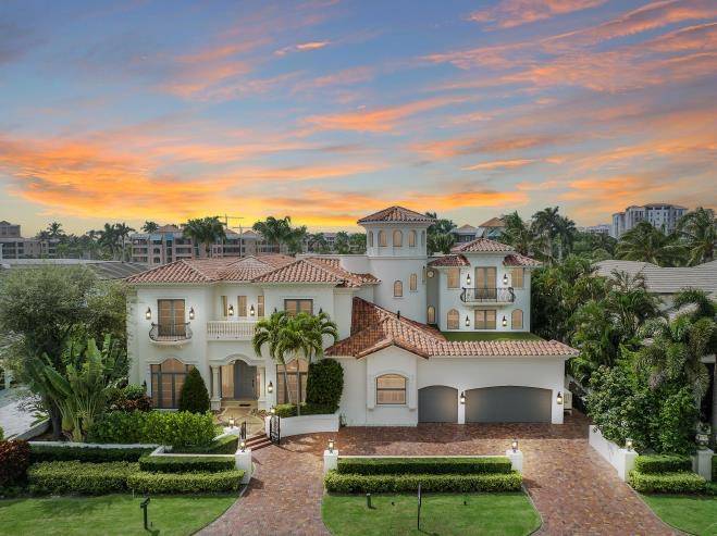 DISCOVER THIS STUNNING HOME LOCATED DIRECTLY ON THE INTRACOASTAL WITH A RARE 115 FEET ON THE WATER IMPECCABLY REIMAGINED IN 2023 AS A BRIGHT AND TRANSITIONAL ESTATE.