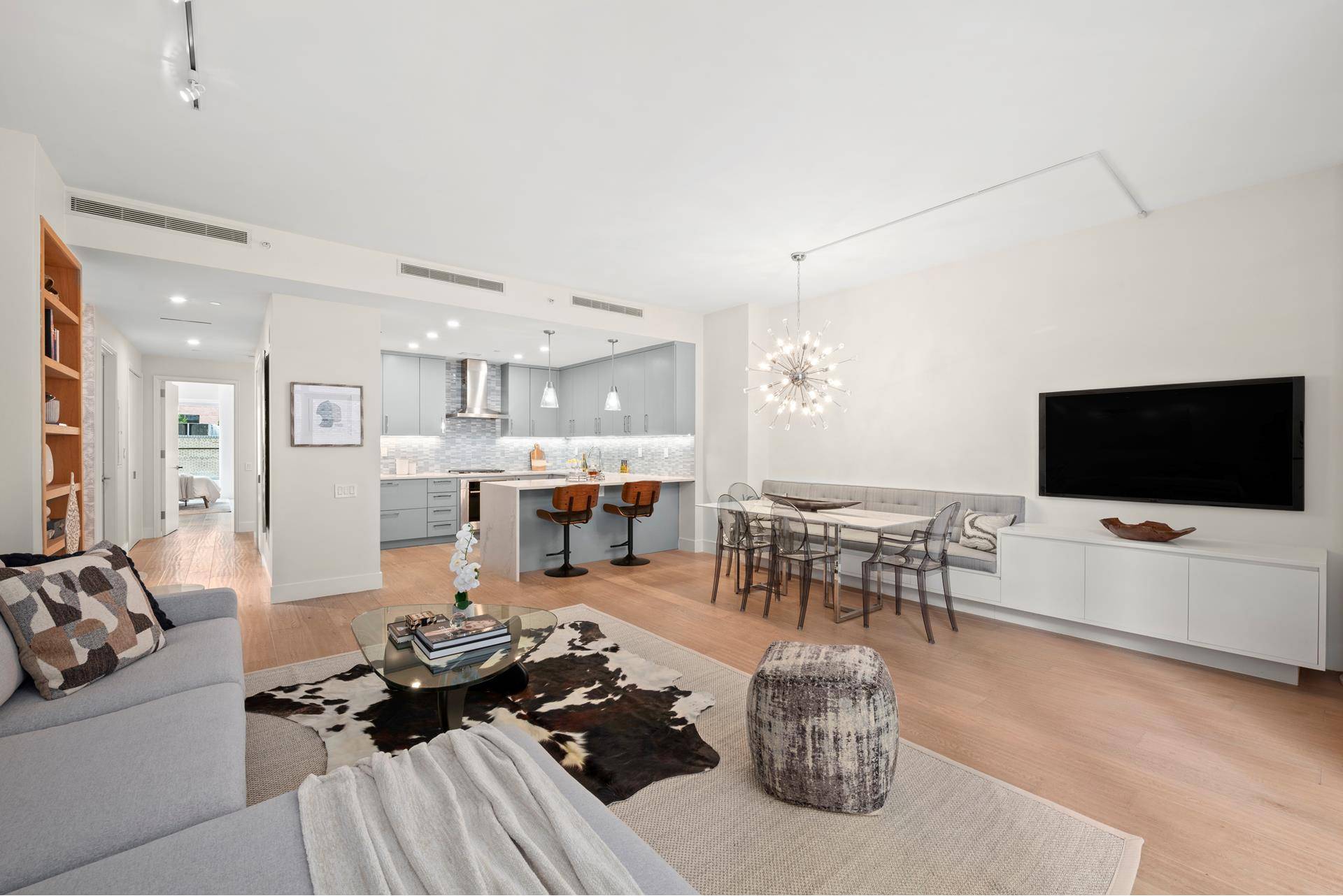 Enormous south facing private terraced condominium with three large bedrooms, three full bathrooms and full time doorman in the heart of West Chelsea !