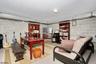 Den/Unfinished basement
