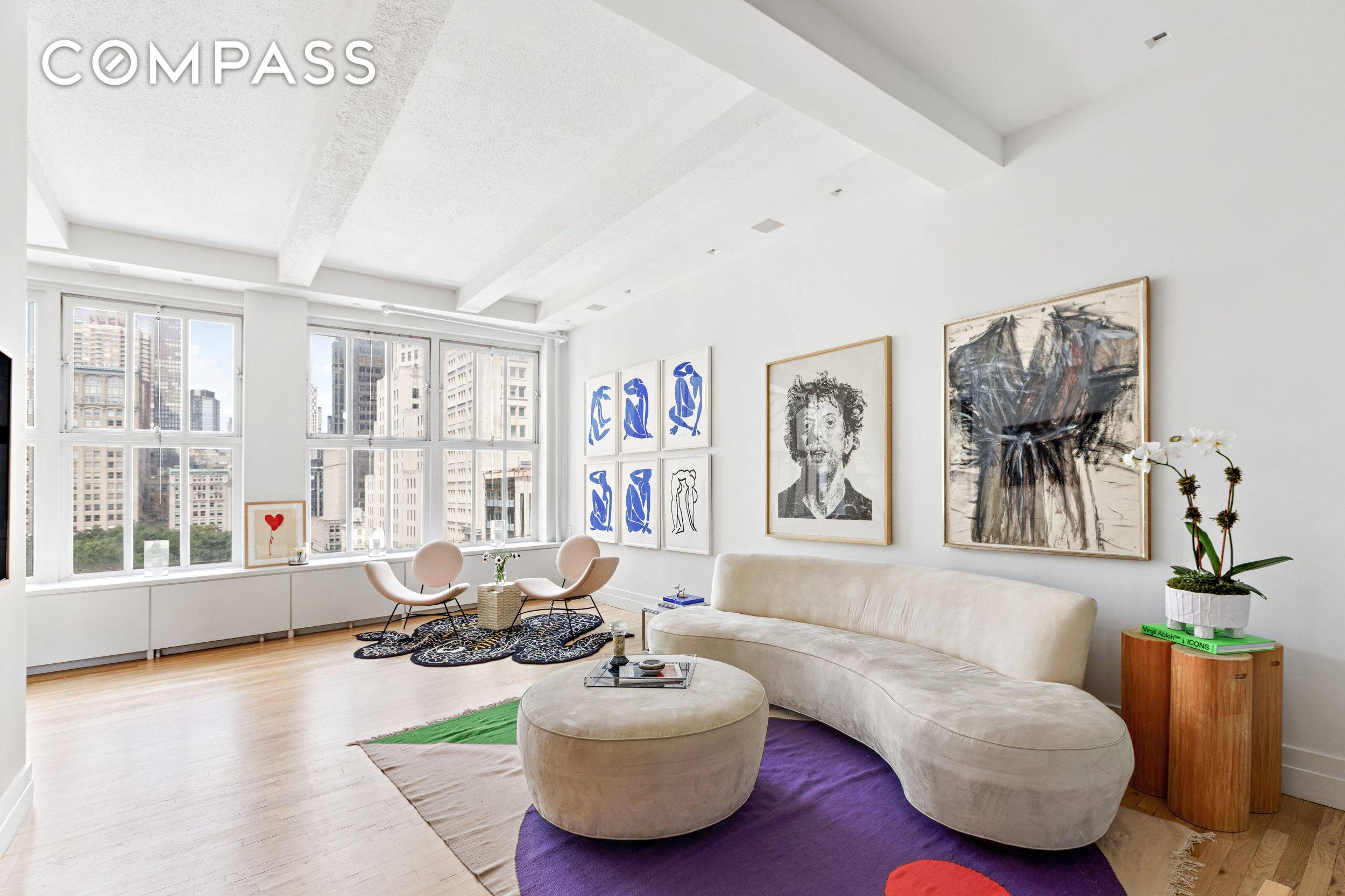Madison Square Park vistas await in this beautiful two bedroom corner loft featuring 11 foot beamed ceilings, wonderful walls for displaying art, and tasteful finishes throughout.
