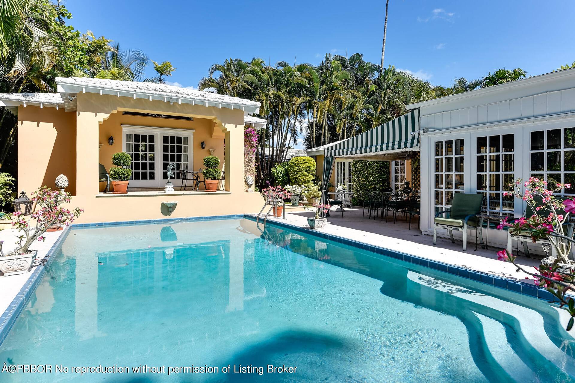 Renovate or build new. Palm Beach pool home offering 3 bedrooms, 3 baths plus a one bedroom guest house with bath and kitchenette.