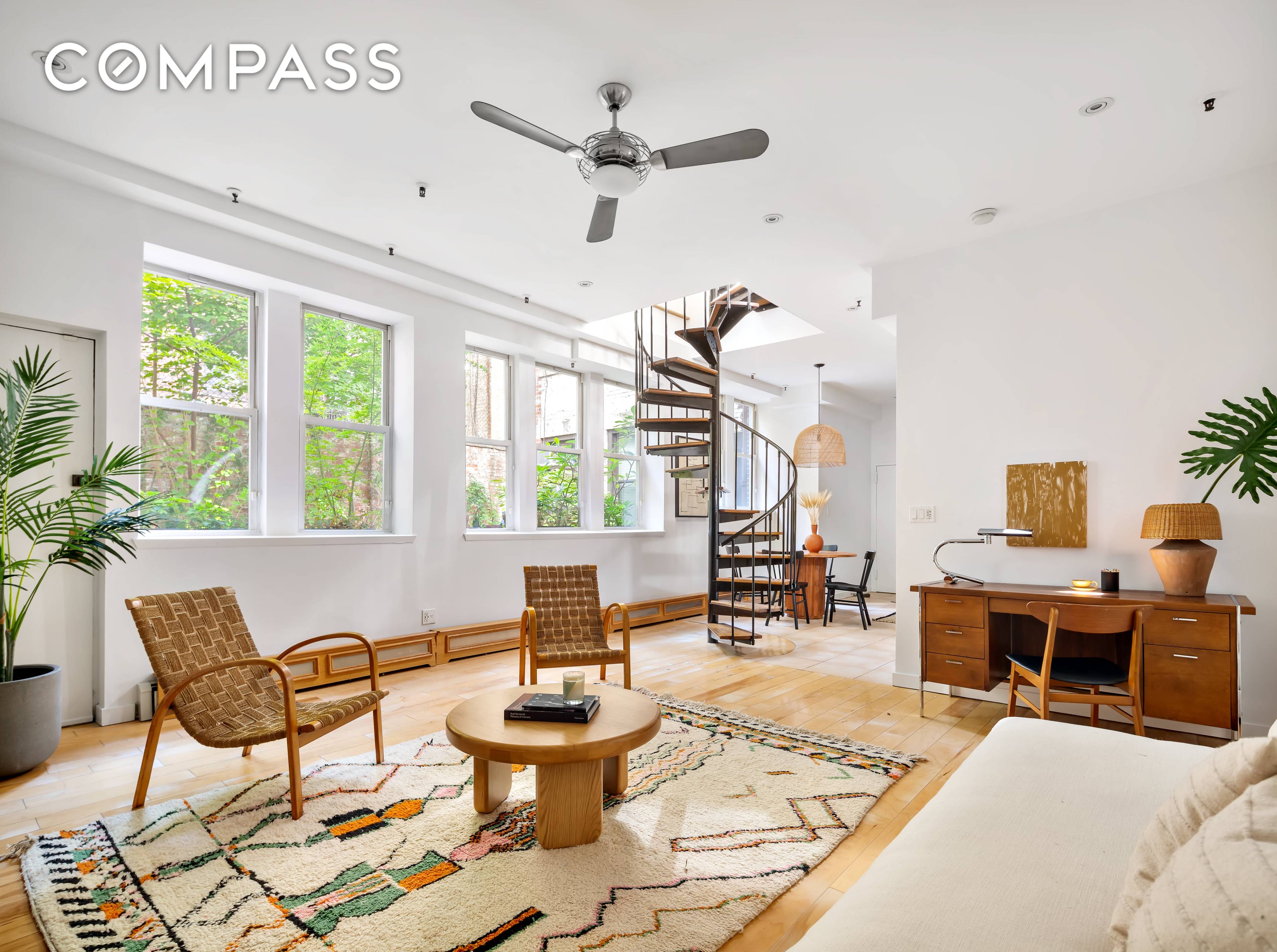 Live in the heart of the East Village in this tranquil, loft like 2 BR 2.