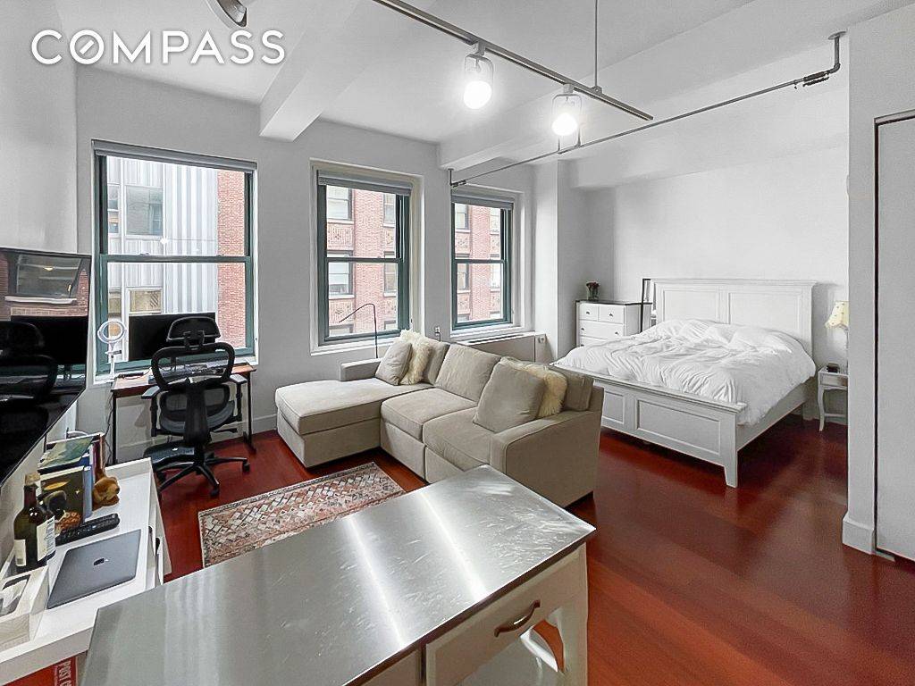 Come Home to this beautiful loft style Condo in the heart of the Financial District.