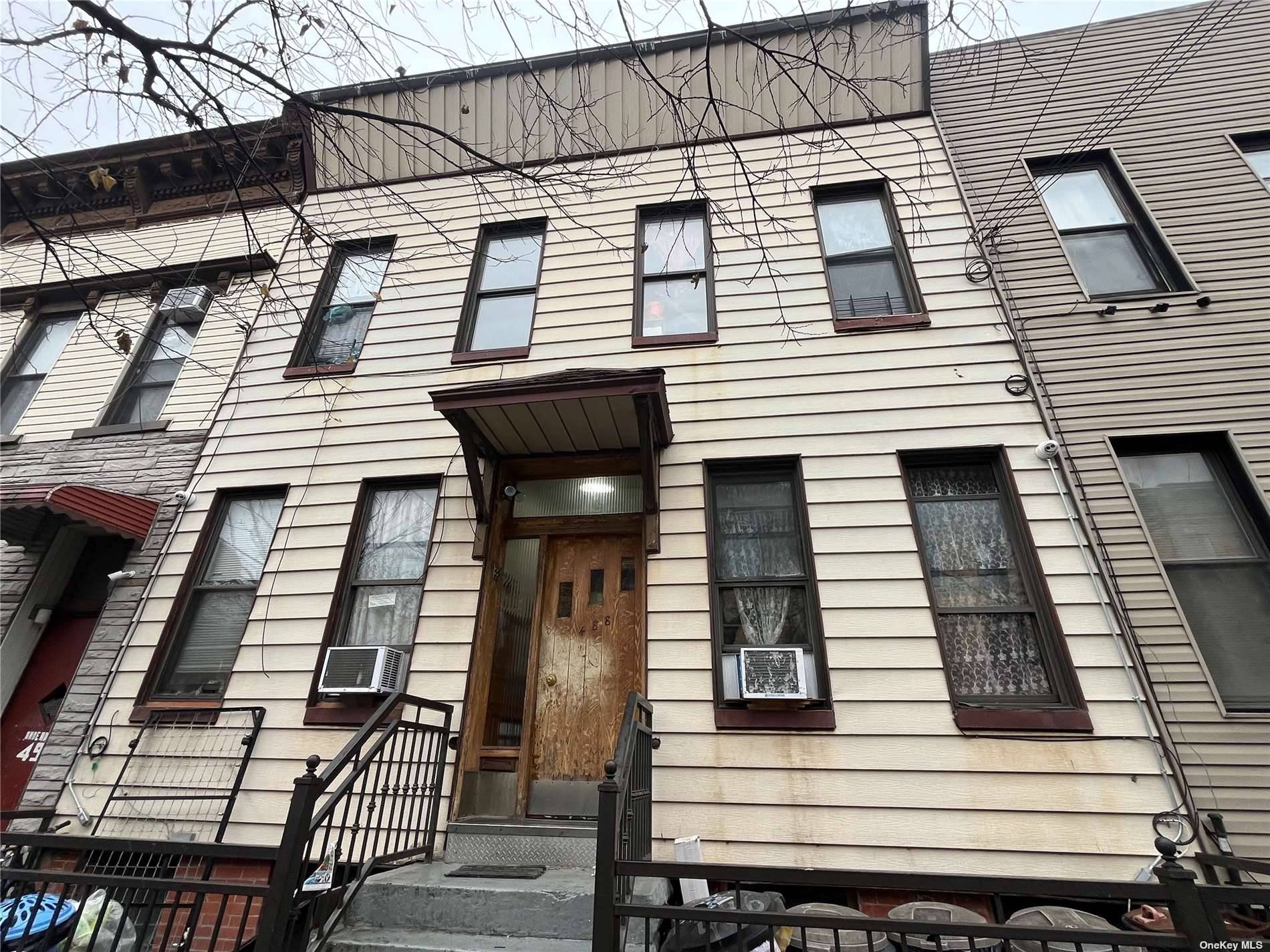 Very nice condition 4 family property in the heart of Ridgewood, high ceilings, traditional railroad style apartments, 3 Bedrooms with Living Room and Eat Kitchen.